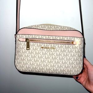 Michael Kors cross body purse with matching wallet
